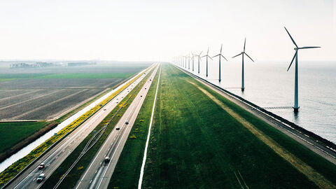 Expansive roadway near to windmills